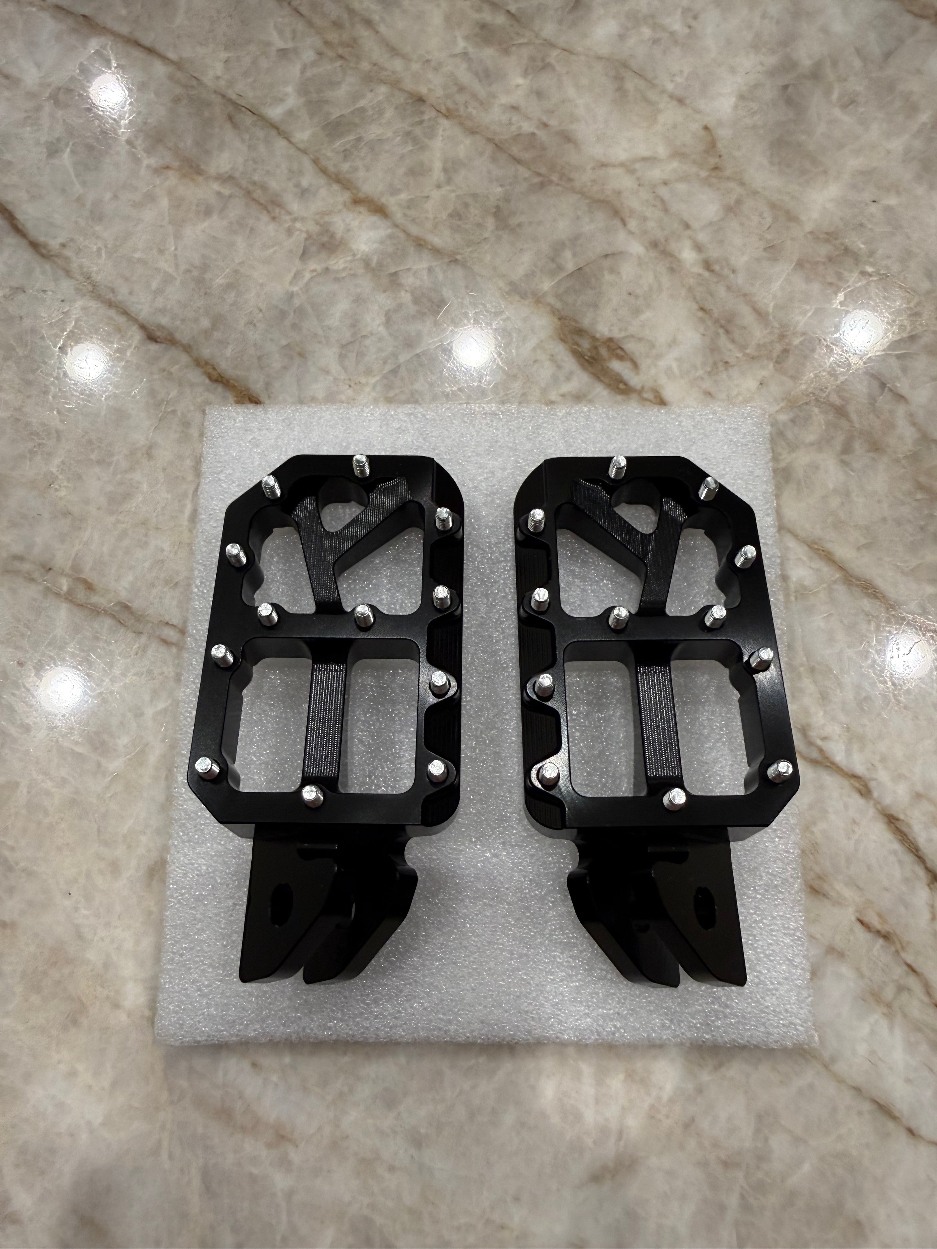 E-Moto titanium foot pegs