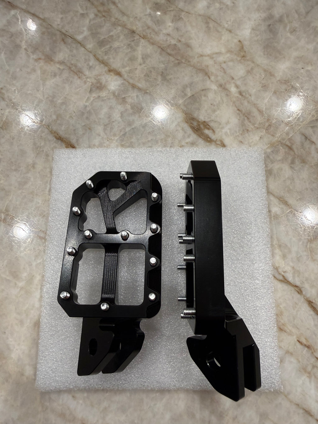 E-Moto titanium foot pegs