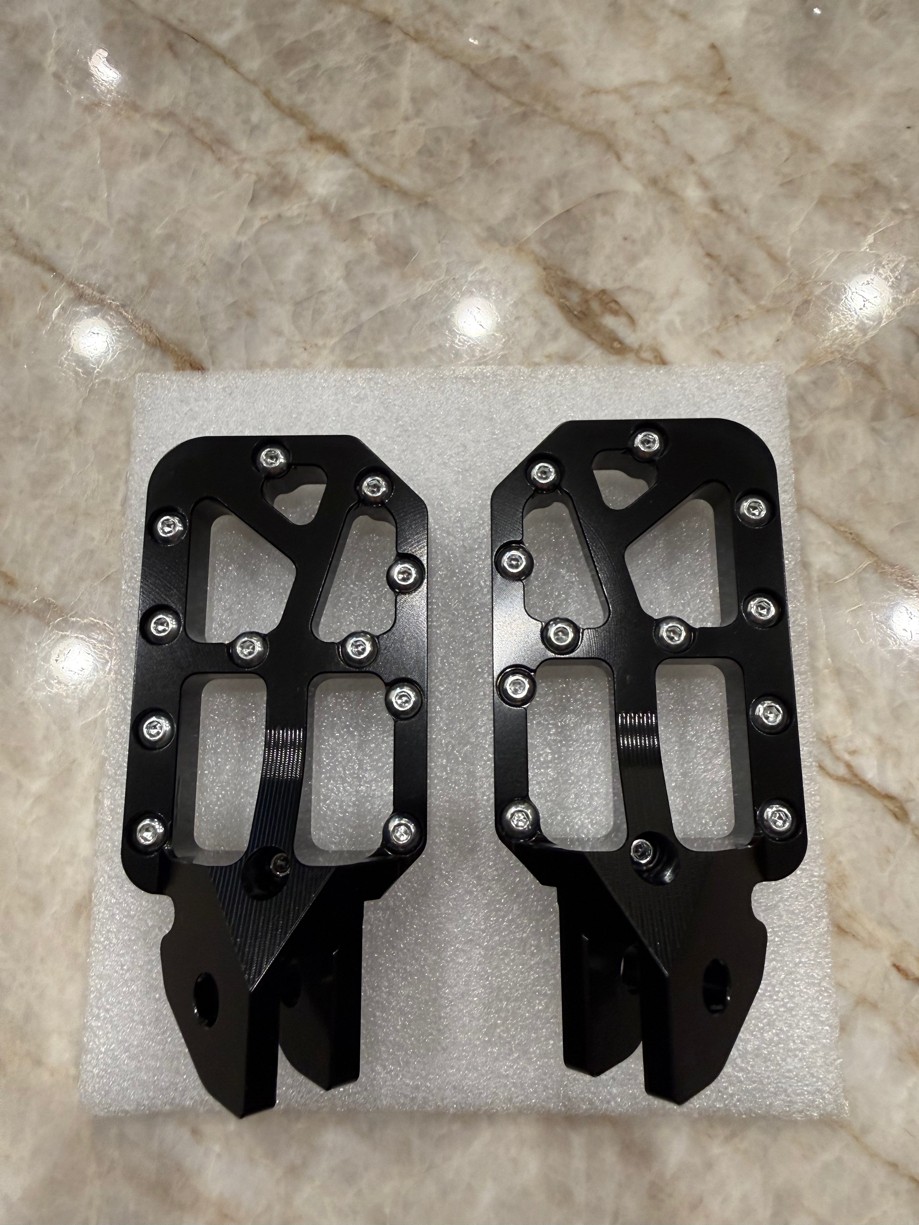 E-Moto titanium foot pegs